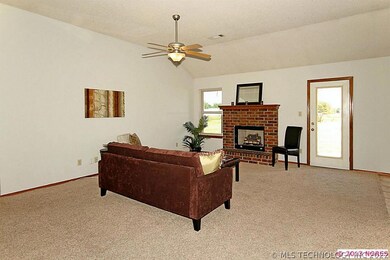 Brick fireplace, ceiling fan, clean carpets, and f