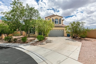 View of front of home with driveway, a fenced fron