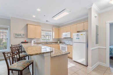 Kitchen with kitchen peninsula, electric panel, wh