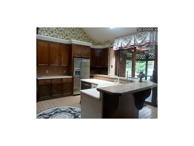 Another view of the kitchen looking out to a cover