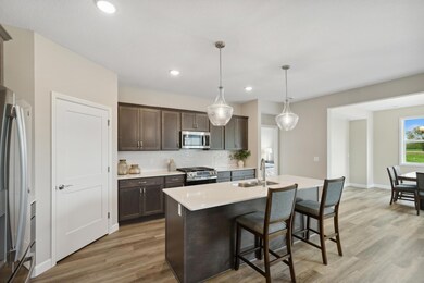 Kitchen - photo is of a previous inventory home. Inquire for more details and options.