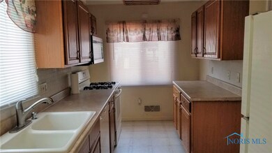 Kitchen has great cabinet space