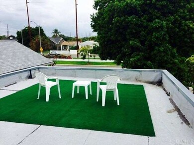 Garage roof deck with bike path and mountain views