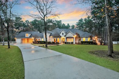 Circular drive and porte-cochère with covered parking offer plenty of space for guests and give a private feel.