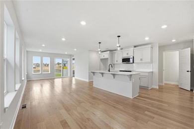 1312 SE Windbreak Dr, Lee's Summit, MO 64081 - photo 4