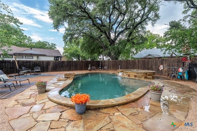 Beautiful inground heated pool and hot tub.  You w