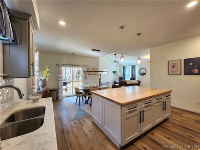 Kitchen featuring dark hardwood / wood-style floor