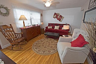 NOTE THE GLEAMING HARDWOOD AND LARGE NEW WINDOW WE
