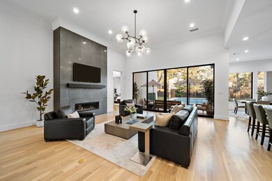 Floor-to-ceiling windows and wide-plank hardwoods