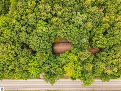Aerial view of the home and it's beautifully woode
