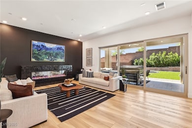 Living room featuring multi-panel glass pocket sli