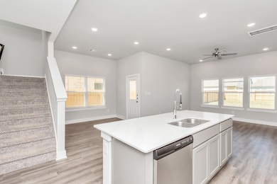 Your island kitchen with dining and living area; a