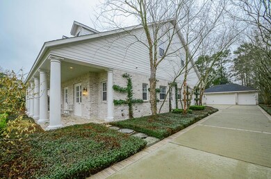 Detached three car garage, full sprinkler  system, and French drain system.