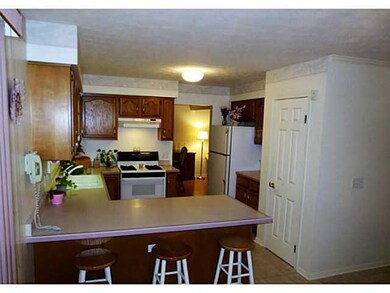 Kitchen. Alternate view of kitchen showing breakfa