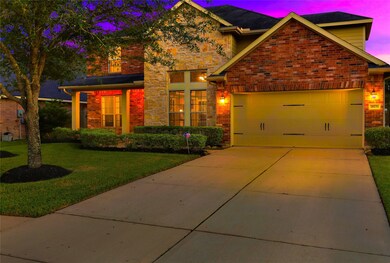 Stone and brick elevation has great curb appeal! Nice front porch to sit outside and enjoy with neighbors!