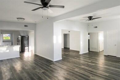 VIEW OF OPEN FLOOR PLAN SHOWING BREAKFAST AREA & L