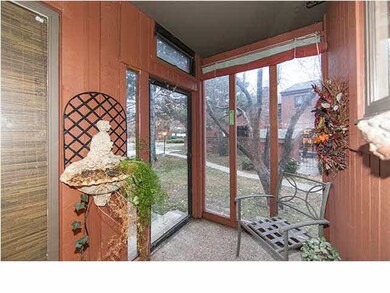 Enclosed sunroom at front entrance