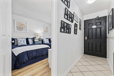 Entrance foyer featuring light tile patterned floo