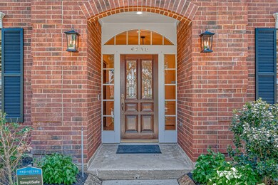 Beautiful entry with newly refinished front door a