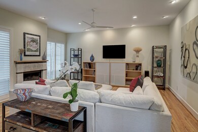 The living/dining room is a wide open space with r