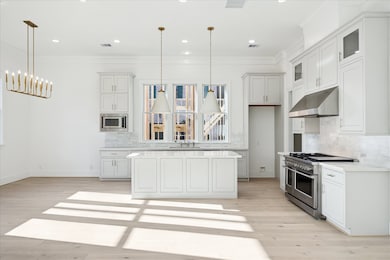 Beautiful quartz & marble kitchen with Fisher & Pa