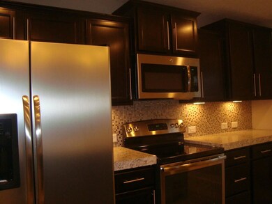 Notice the under cabinet lighting plus the pretty 