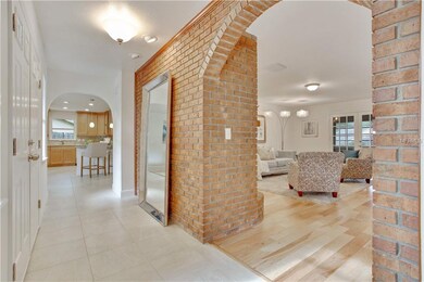 You can't miss this beautiful brick arched entry t