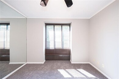 Formal dining room also accented with mirrored wal
