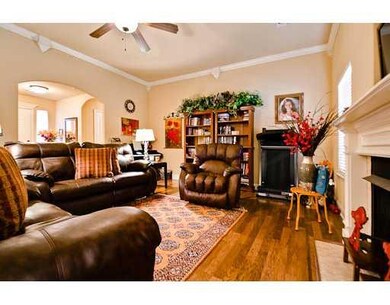 Living Room. Gorgeous hardwood floors and a gas lo