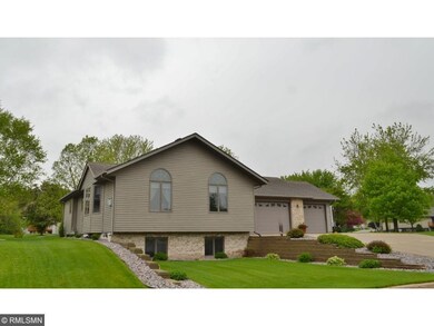 Impeccable curb appeal on beautifully manicured co