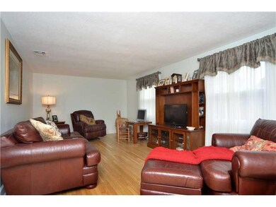 Living Room. A light bright room with two large wi