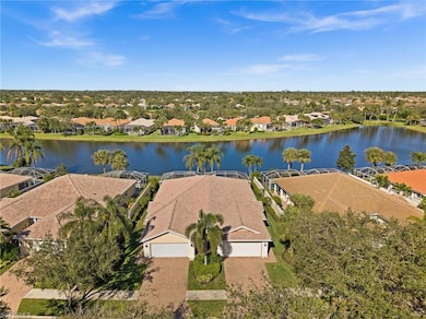 Bird's eye view with a water view and a residentia