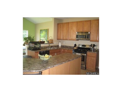 Spaciaous kitchen with center island.