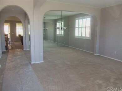 Entrance with living and dining room