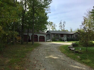 Attached 3 car garage with full...