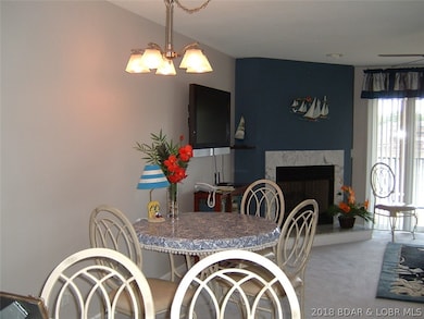 Dining area and gas fireplace in corner