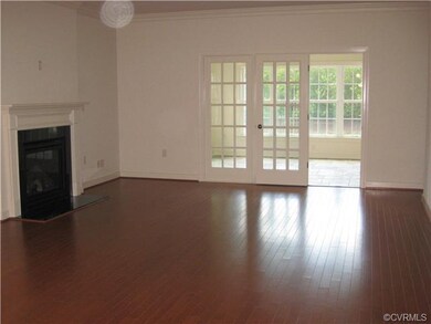 Family Rm looking into Sunroom; Model Picture