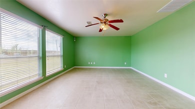 Spacious living room filled with natural light.