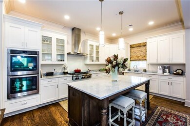Modern kitchen with natural stone tops.