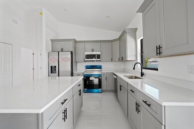 2458 NW 9th Terrace, Cape Coral, FL 33993 - photo 6