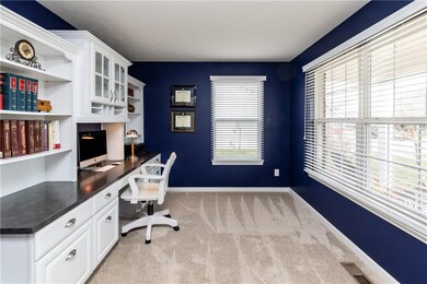 Office with built-in desk and cabinets!