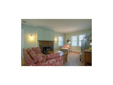 Living room with entertainment center on right- gr