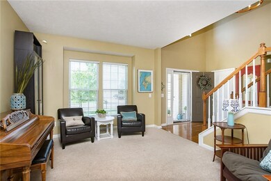 View of Living Room and Entry from Dining Room