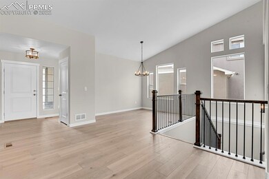 Vaulted ceiling & metal railing