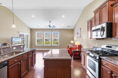 Kitchen featuring dark hardwood / wood-style floor