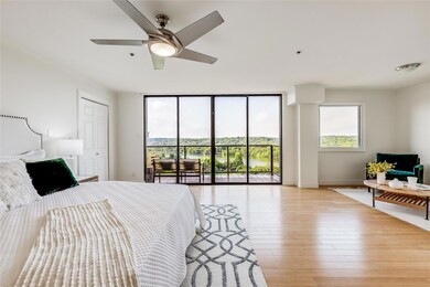 Bedroom featuring access to outside, multiple win