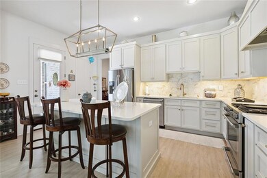 Extra seating at the kitchen island. Undermount li
