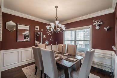 This beautiful Dining Room overlooks the Covered Patio and is adjacent to the Kitchen with a convenient pass thru. 