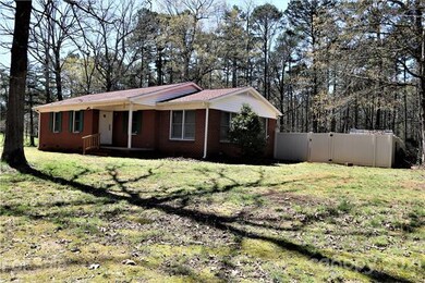 Privacy fence surrounds rear of the house.