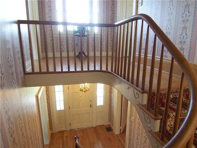 Entry/Foyer. Foyer leads to Curved Staircase